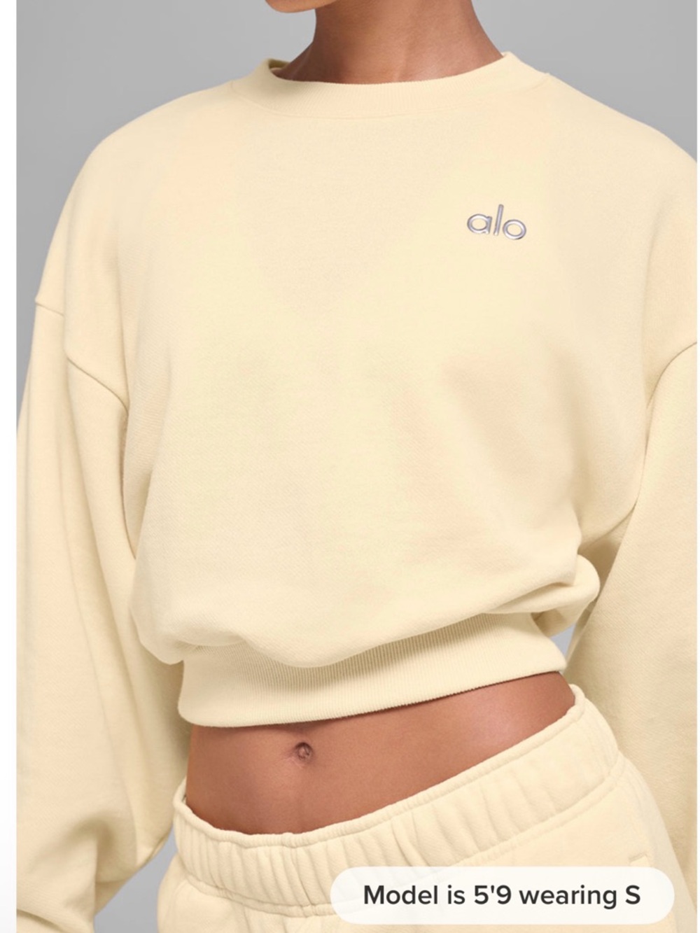 Alo Cropped Crewneck Sweatshirt in candle light yellow